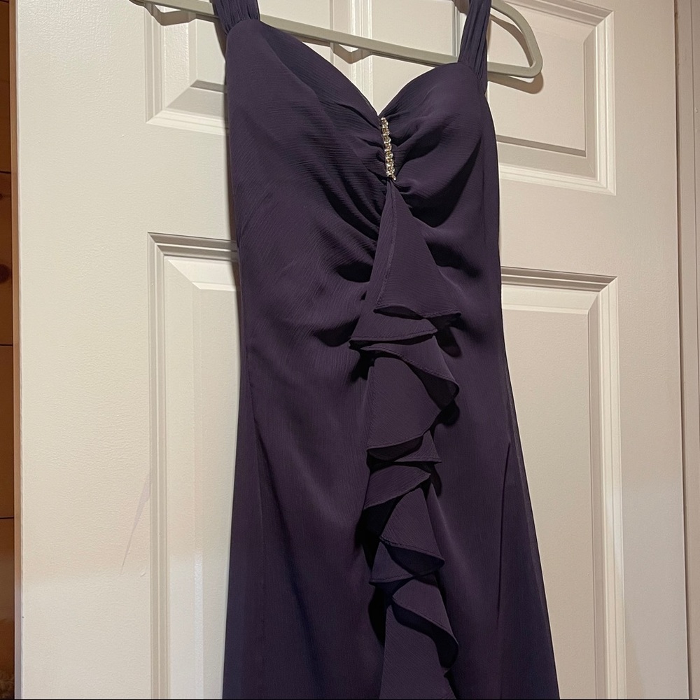 Beautiful purple dress.
